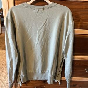 Lt army green sweatshirt, sz small, slits up sides